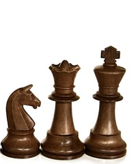 chess pieces on a chess board ready for battle stock photo