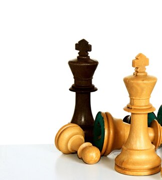 chess pieces on a chess board ready for battle stock photo