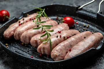 Close up Raw sausages with herbs and spices. Ketogenic diet. top view