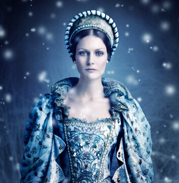 Here comes winter. Portrait of a evil-looking queen with snow falling around her.
