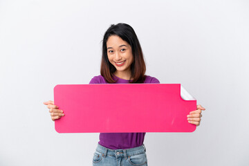 Young Vietnamese woman isolated on white background holding an empty placard