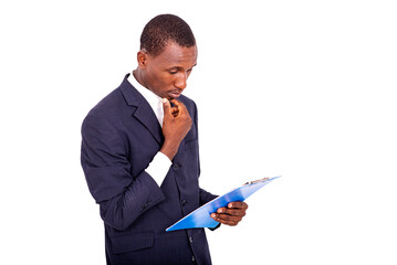 portrait of be businessman with note pad, thoughtful.