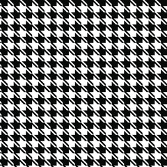 Classic retro houndstooth seamless pattern. Geometric checkered plaid background. Black and white colors. Fabric, textile, skirts, clothes, wrapping paper design. Vector illustration.
