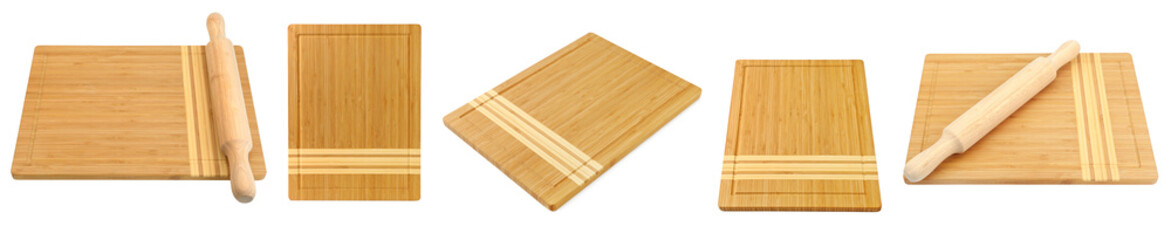 Big set wooden boards for cutting bread and rolling pin isolated on white