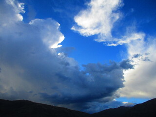 sky, clouds, mountain, cloud, landscape, nature, sunset, sun, mountains, sunrise, summer, weather, day, cloudy, view, blue, hill, light, white, sunlight, beauty, blue, white, weather, outsite, relax