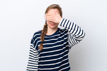 Naklejka premium Young caucasian woman isolated on white background covering eyes by hands. Do not want to see something