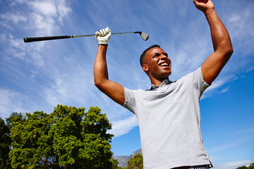 Hole in one. Shot of a young man celebrating his golf shot.