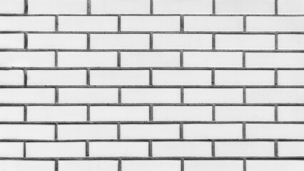 White brick wall background with straight lines. Front, top view.