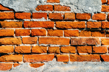 Old brick wall. Abstract background. Brickwork with cement.