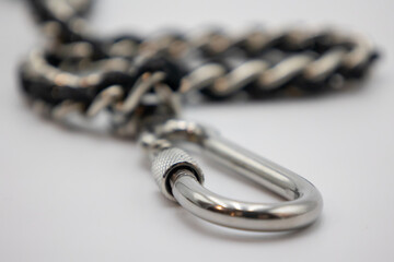 Dog chain with fabric interlaced and there is a latch on the end.