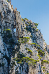 Fototapeta na wymiar Breach in the rock of the cliffs of the Calanque de l'Eissadon on a summer day in France