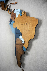 South America continent on a wooden world map on a wall, Brazil, Venezuela, Colombia, Peru,...