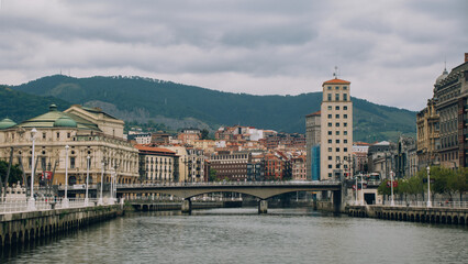 Fototapeta na wymiar Landscape photo of the river and the city of Bilbao