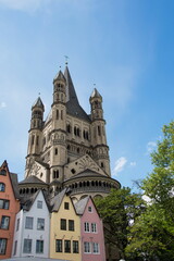 Fototapeta na wymiar Great St. Martin Church and colorful houses in Cologne, Germany,2017