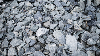 Gravel stones form a beautiful and rugged pattern. 
