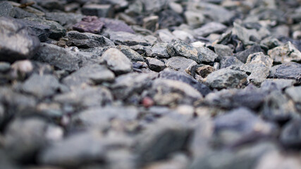 Gravel stones form a beautiful and rugged pattern. 

