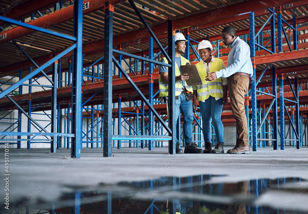 Aufkleber they dont just design the future, they enhance it. shot of a group of builders inspecting a construc
