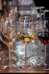 Many glasses of white and red white served for party or celebration