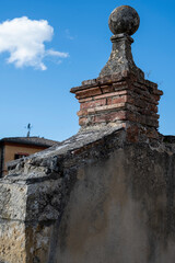 Inside old town walls in medieval fortress town on hilltop Monteriggione in Tuscany, Italy
