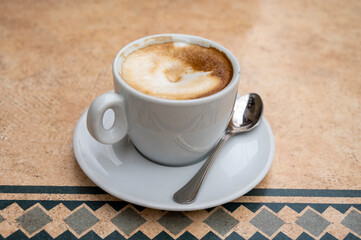 Fresh brewed coffee cappuccino in italian bar, morning coffee