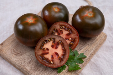 Healthy vegetarian food, reddish brown sweet kumato tomatoes