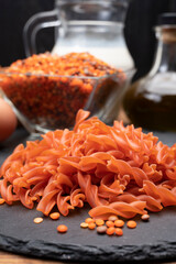 Vegan gluten free and vegetarian food, dried spiral pasta made from orange lentils legumes