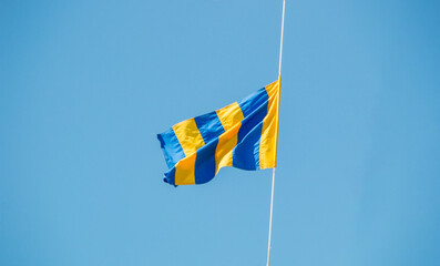 nautical signal flag on a boat moored.