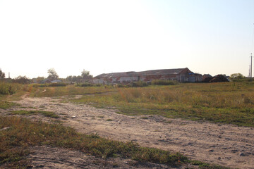 abandoned buildings livestock farms in a Siberian village in the field