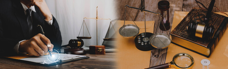 Male lawyer working with contract papers and wooden gavel on tabel in courtroom. justice and law ,attorney, court judge, concept.