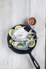 Ikan bawal putih or raw fish pomfret.