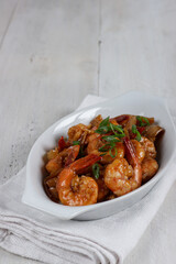 Udang Saus Tiram or fried prawns or shrimp in oyster sauce.