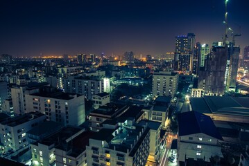 Fototapeta premium Night cityscape of modern capital Bangkok city, Thailand. Building, architecture and city concept.