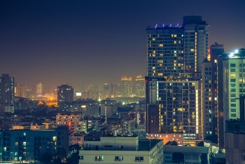 Naklejka premium Night cityscape of modern capital Bangkok city, Thailand. Building, architecture and city concept.