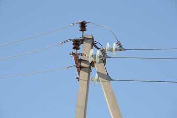 Electric power lines and wires with blue sky.