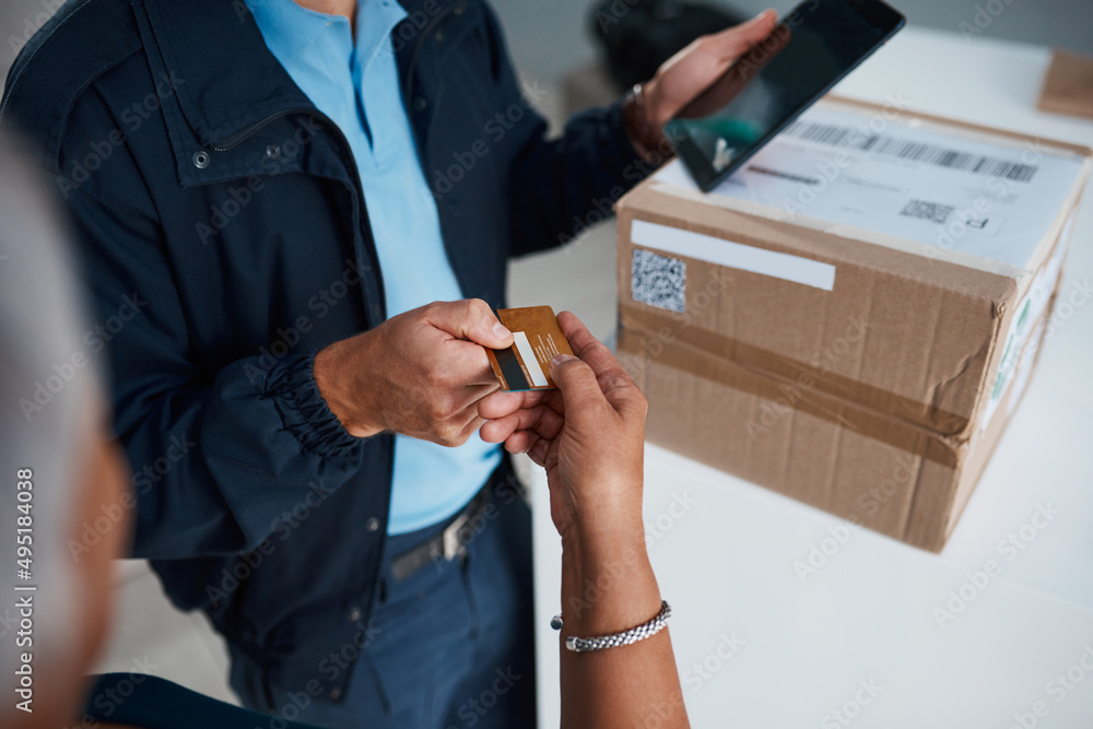 Aufkleber the best and safest way to pay these days. cropped shot of an unrecognizable man delivering a packag