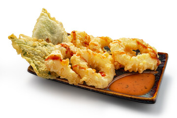 Squid skewers in tempura with sweet and sour sauce on a white background