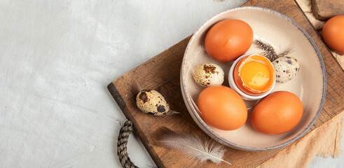 Chicken eggs composition on gray background.