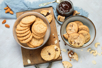 Delicious oat cookies on light background.