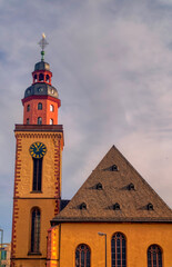 Old church with clock tower in downtown in Frankfurt am Main, Germany.