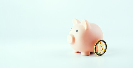 Save currency bitcoin. Pink pig bank with golden bit coin money BTC on white background. Save money investment and business finance.