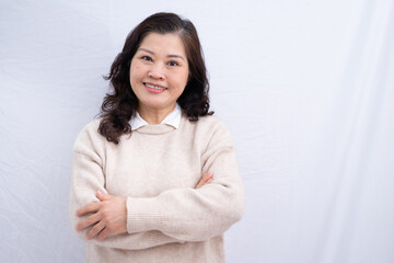 Portrait of senior Asian woman on white background - obrazy, fototapety, plakaty