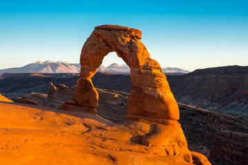 The Delicate Arch and mountain behind it.