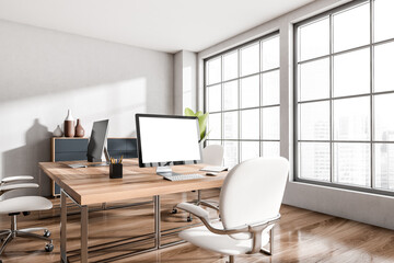 Business interior with pc desktop, table, panoramic window and mockup display