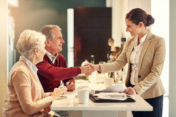 Start planning for a richer retirement today. Shot of a senior couple getting advice from their financial consultant.