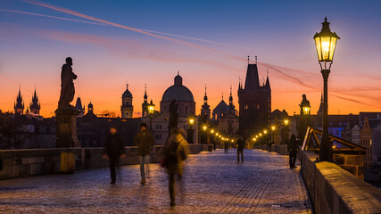 Naklejka na ściany i meble Lit lamps on the Charles Bridge, sunrise