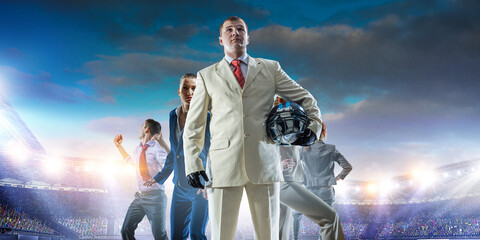 Businessman acting as american football players . Mixed media