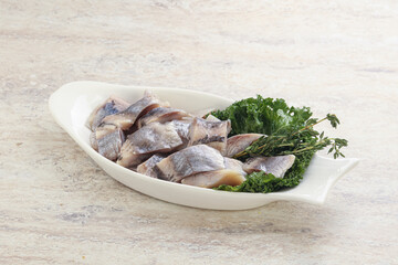 Herring fillet slice on the bowl