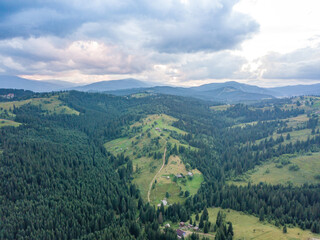 Green Ukrainian Carpathians mountains in summer. Aerial drone view.