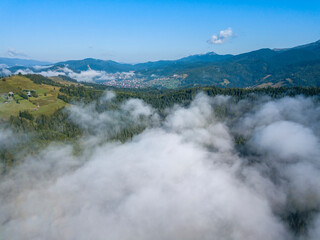 Morning fog in the Ukrainian Carpathians. Aerial drone view.