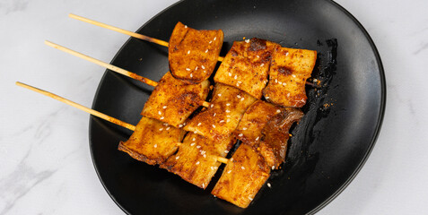 Grilled BBQ Spicy Mala Food. Sausages, Crab Sticks, Chicken and Pork © David
